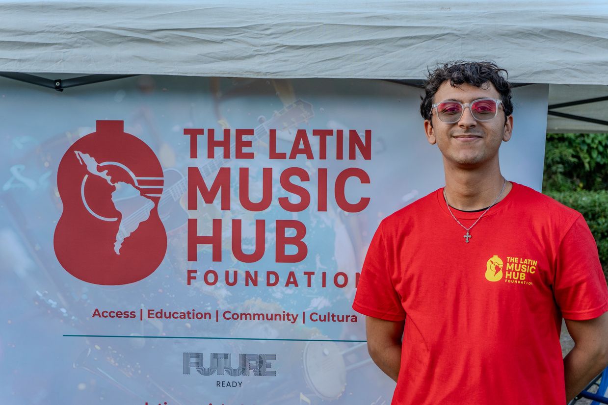 A volunteer at the Foundation booth