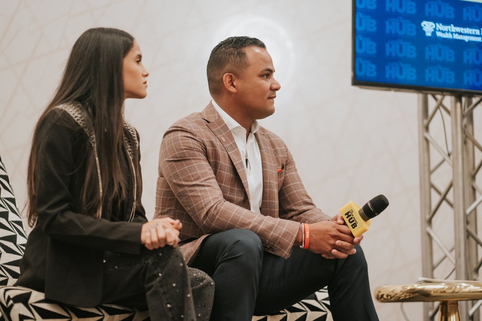 Two panelists listening during the money talk